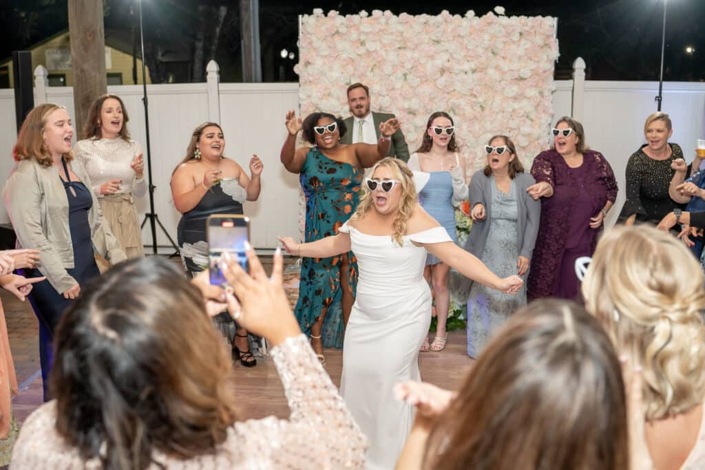 Stress free Bride having fun on he dance floor at her Butler's Courtyard wedding