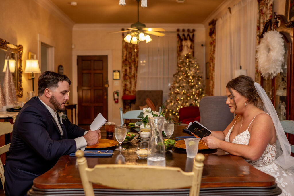 Bride and Groom share private vows at the beginning of their private meal, a treasured tradition at the all-inclusive wedding venue Butler's Courtyard in Houston Texas